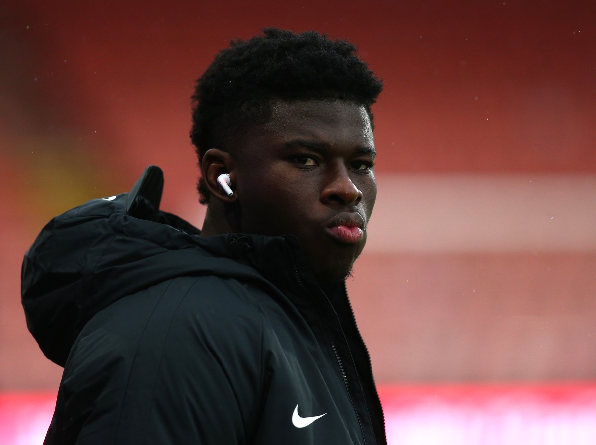 Brighton's Carlos Balba inspects the pitch before the match