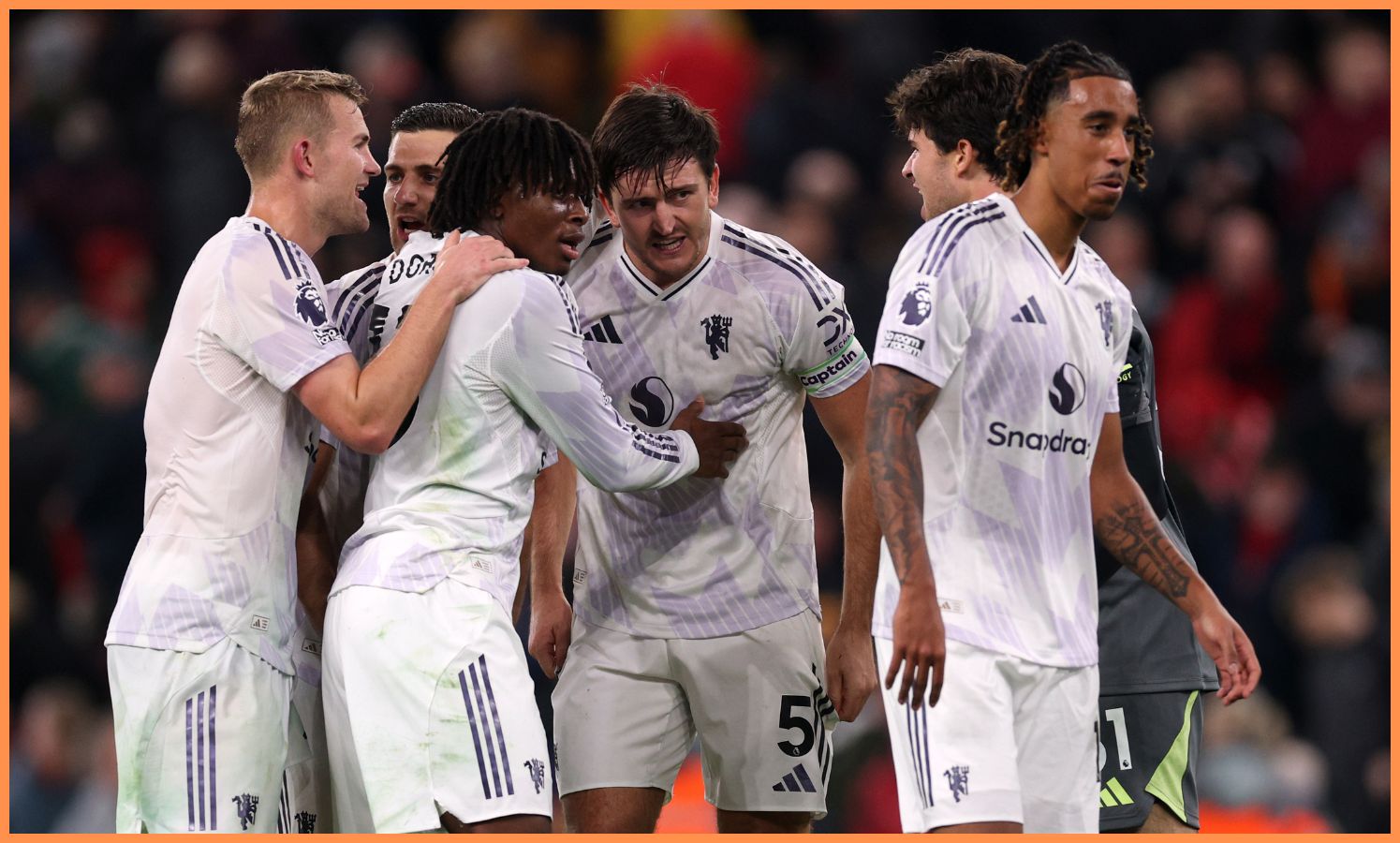 Matthijs de Ligt celebrates with his Manchester United teammates