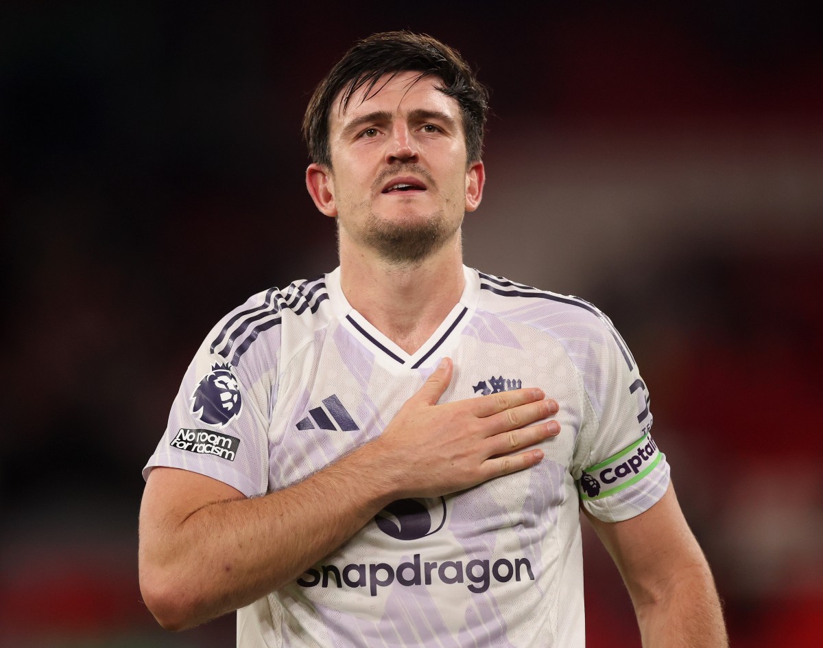 Harry Maguire celebrates Manchester United's win vs Liverpool at Anfield