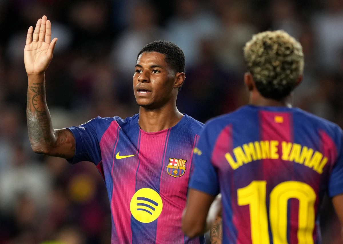 Marcus Rashford celebrates Barcelona's win against Olympiakos