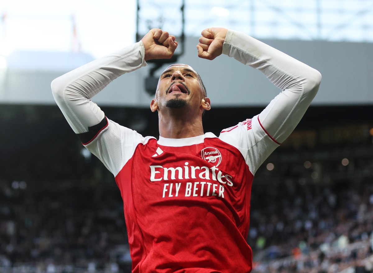 William Saliba celebrates Gabriel's goal for Arsenal against Newcastle