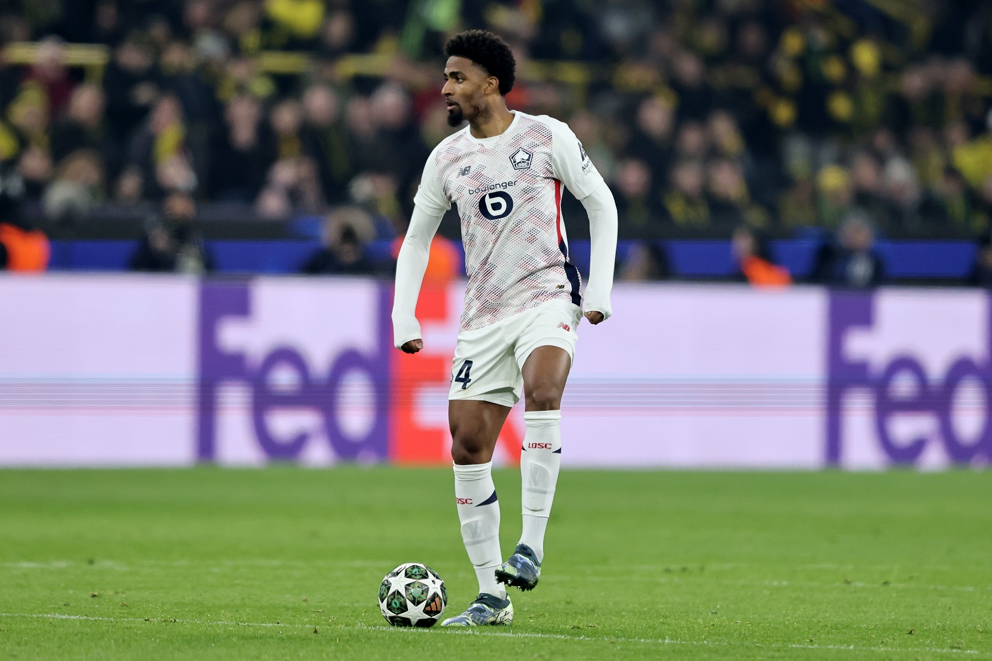 Alexsandro of Lille runs with the ball