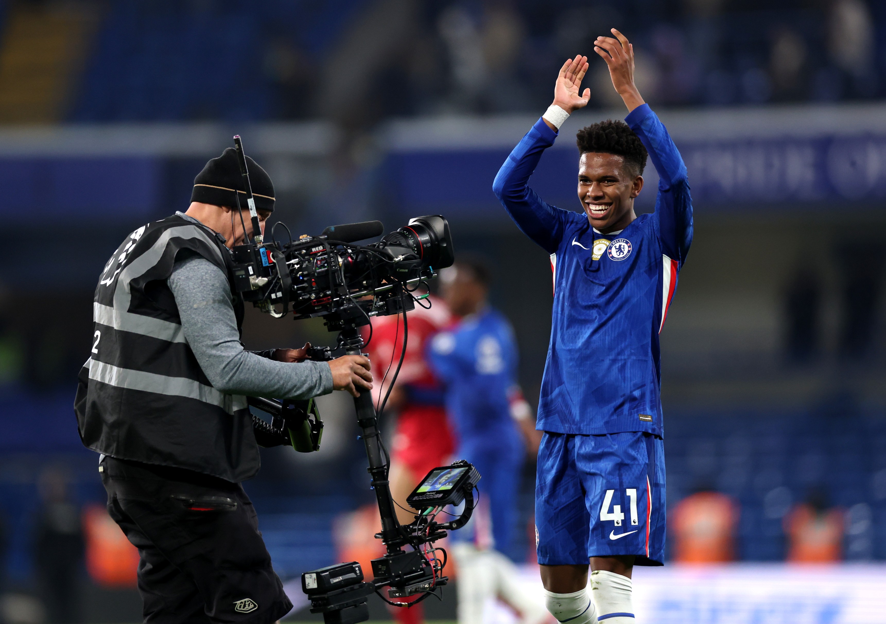Estevao applauds the fans after the team's victory in the Premier League match between Chelsea and Liverpool