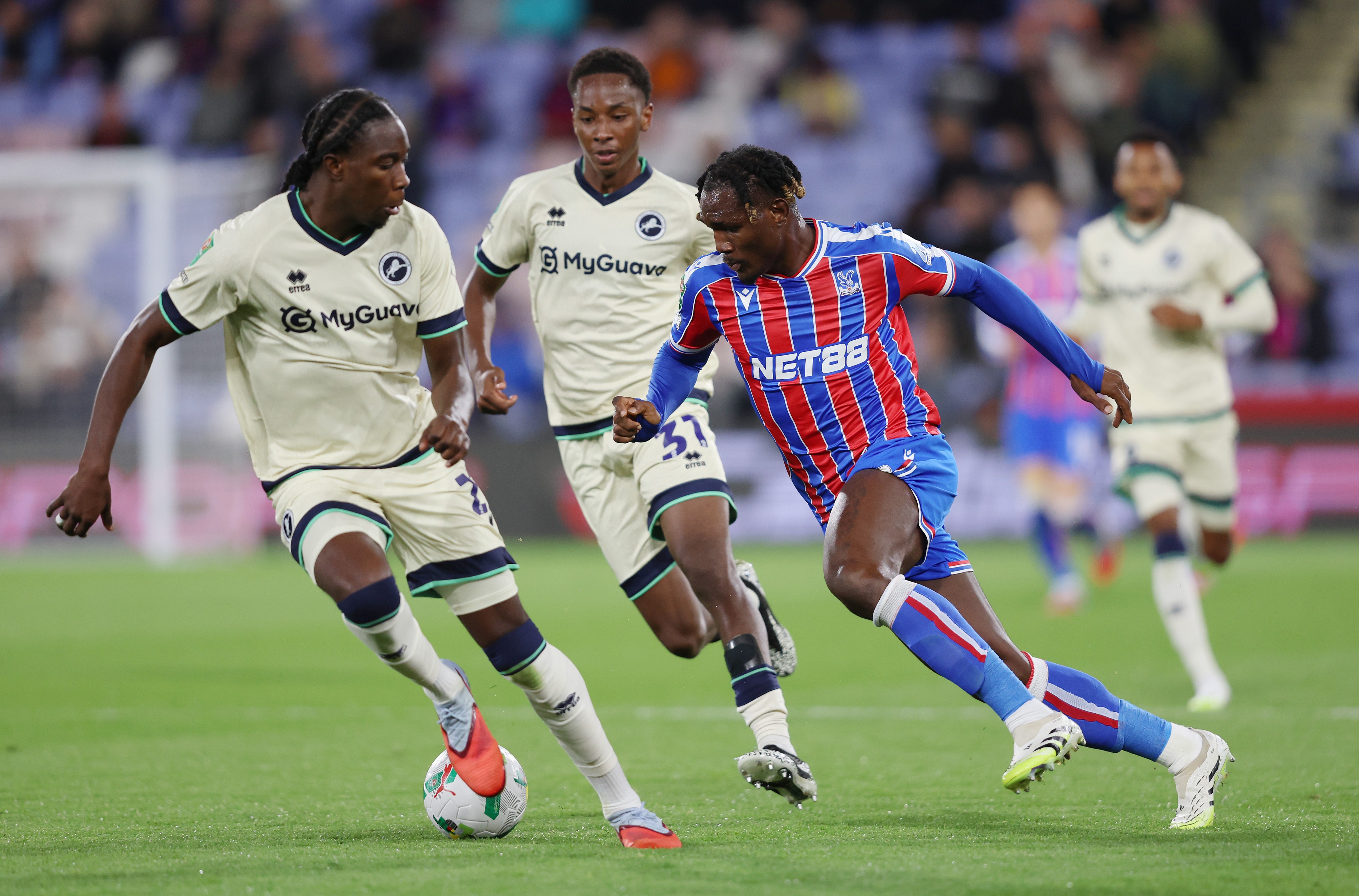 Christantus Uche of Crystal Palace runs for the ball