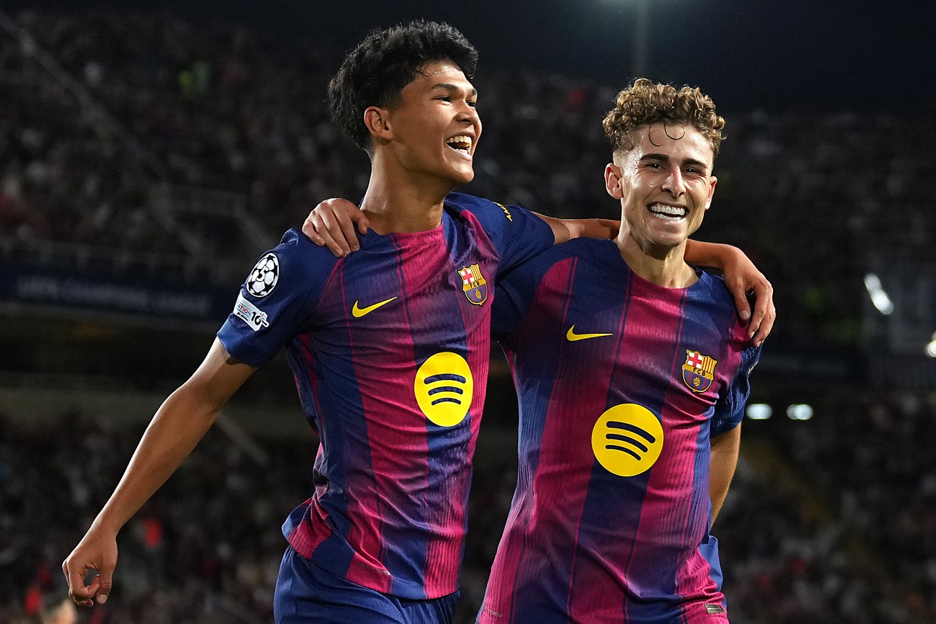 Fermin Lopez of FC Barcelona celebrates  with teammate Pedro Fernandez
