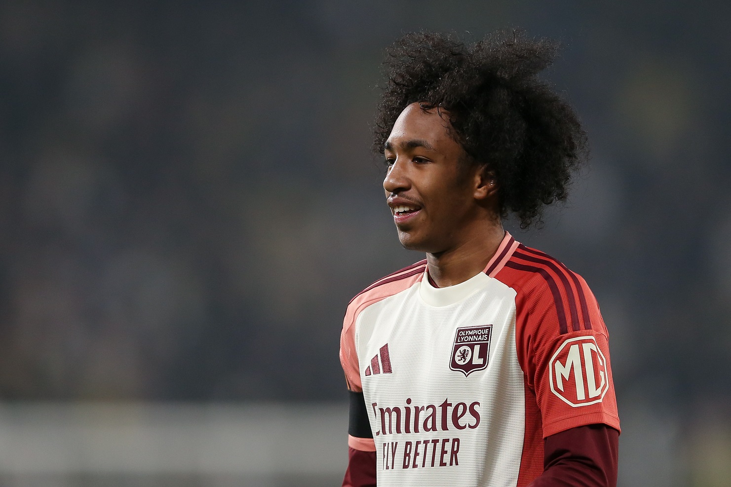Olympique Lyonnais player Malik Fofana looks on