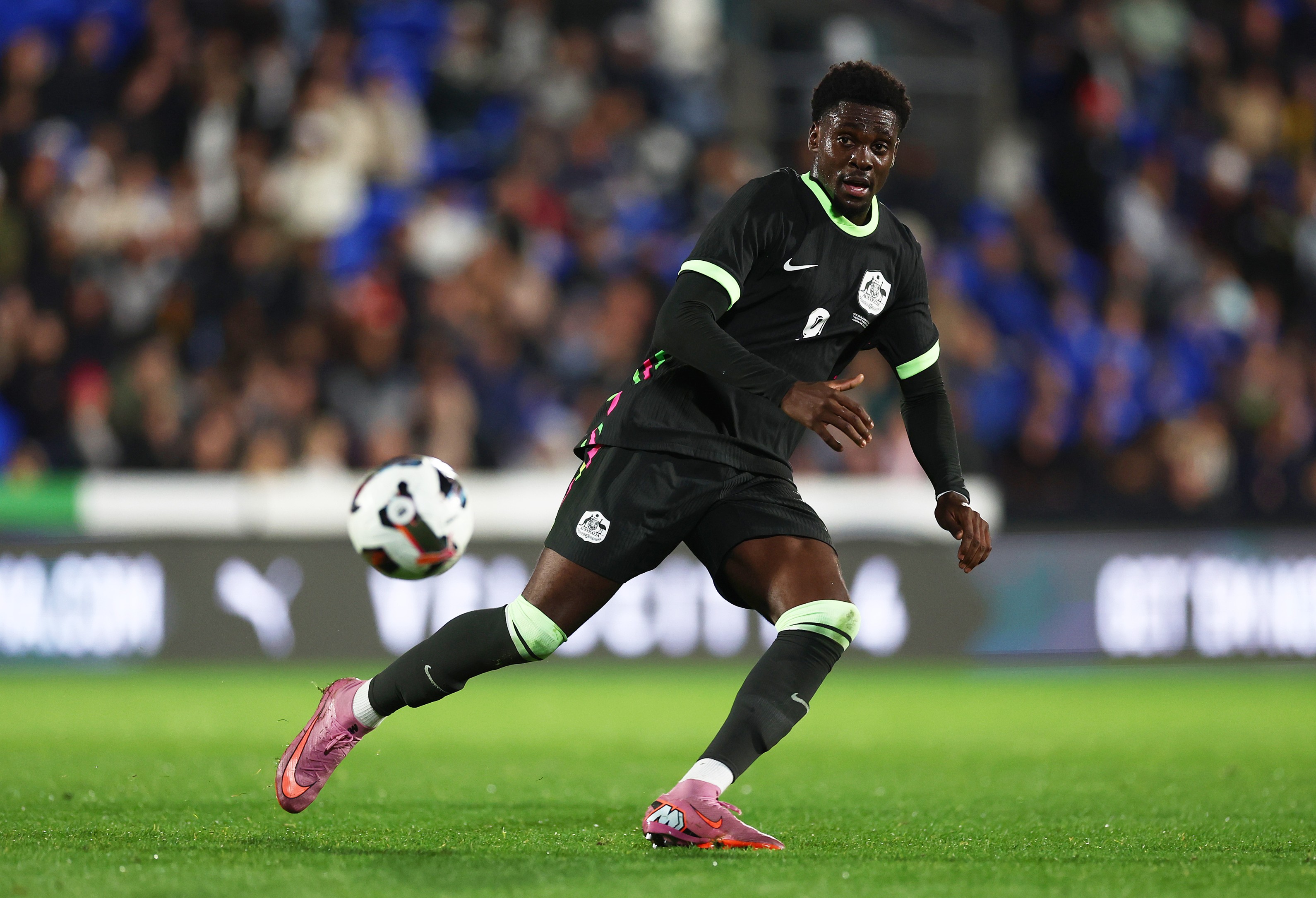 Mohamed Toure of Australia runs off the ball