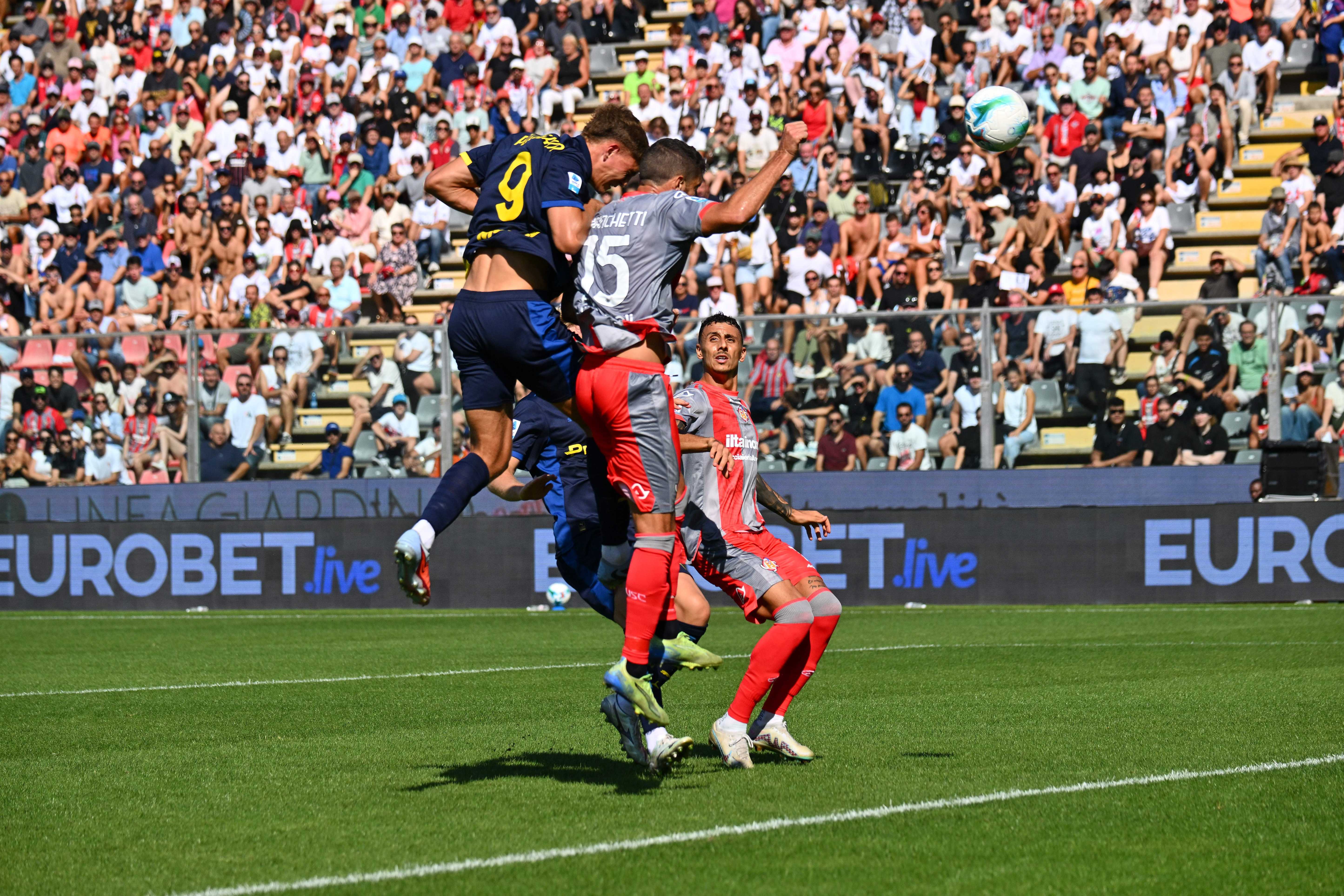 Mateo Pellegrino of Parma Calcio 1913 and Matteo Bianchetti of US Cremonese fight for the ball