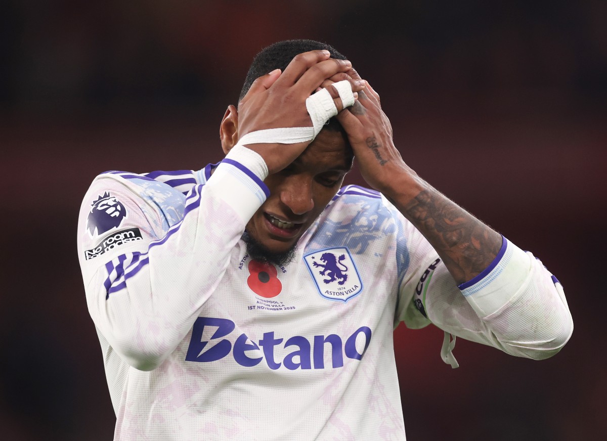 Ezri Konsa reacts during Aston Villa's defeat to Liverpool