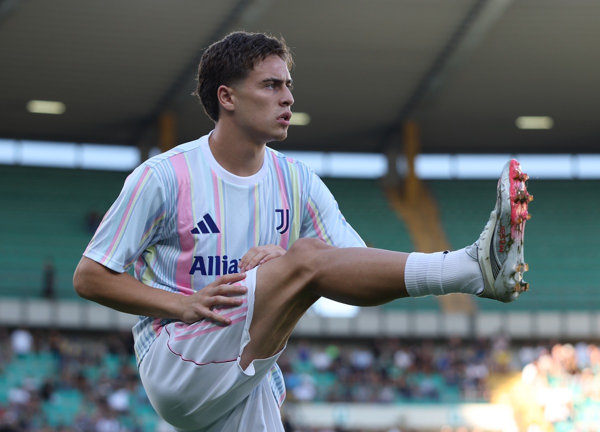 Kenan Yildiz warming up for Juventus