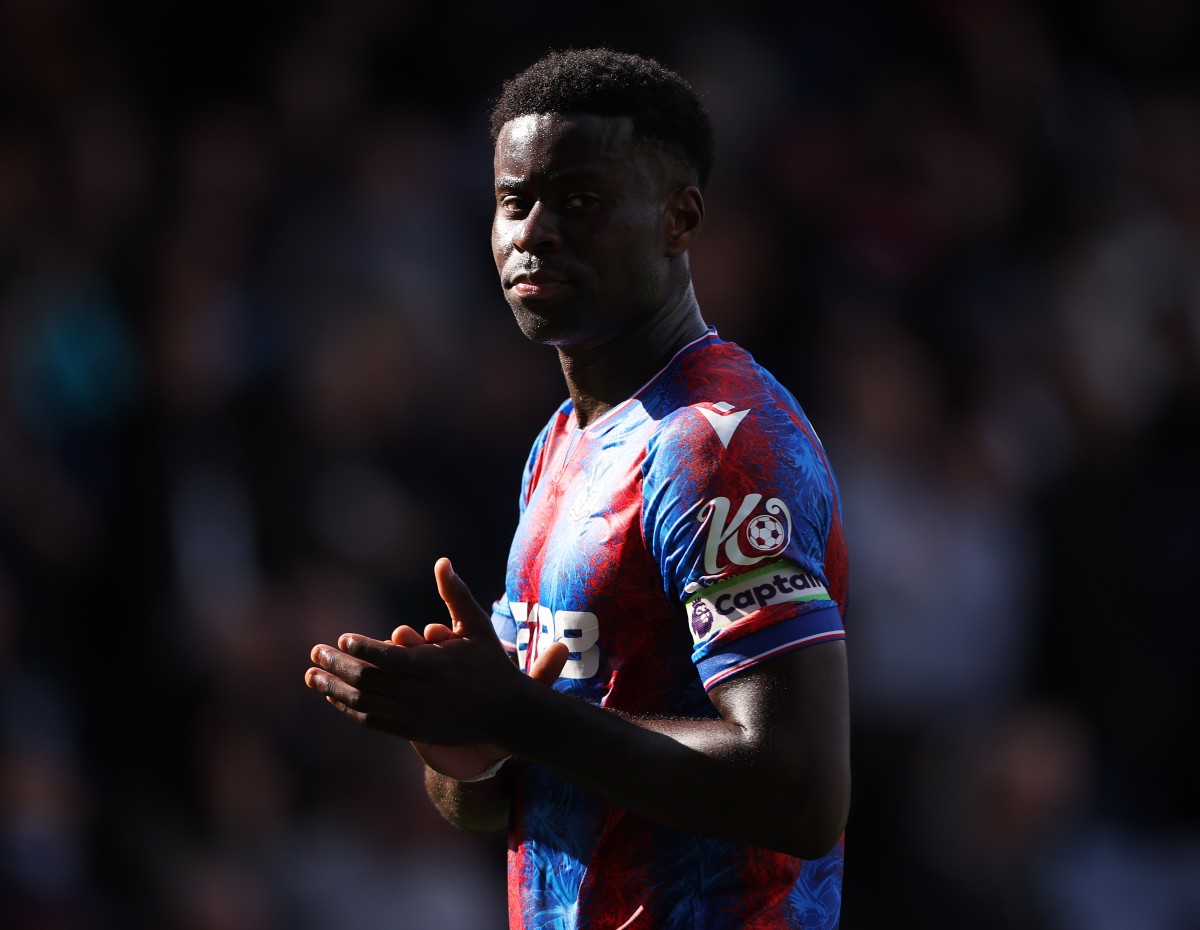 Marc Guehi applauds the Crystal Palace fans