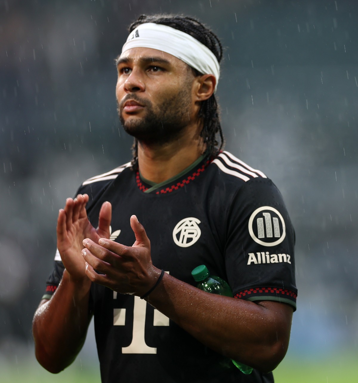 Serge Gnabry applauds the Bayern Munich fans