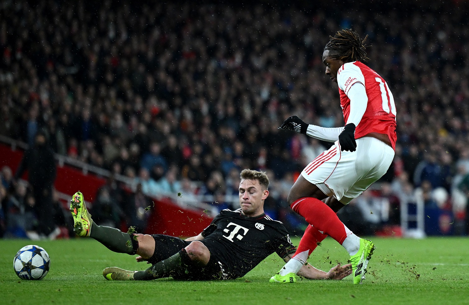 Eberechi Eze of Arsenal against Joshua Kimmich of Bayern Munich