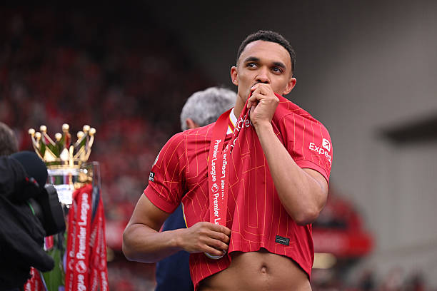 Trent Alexander-Arnold kisses Liverpool badge