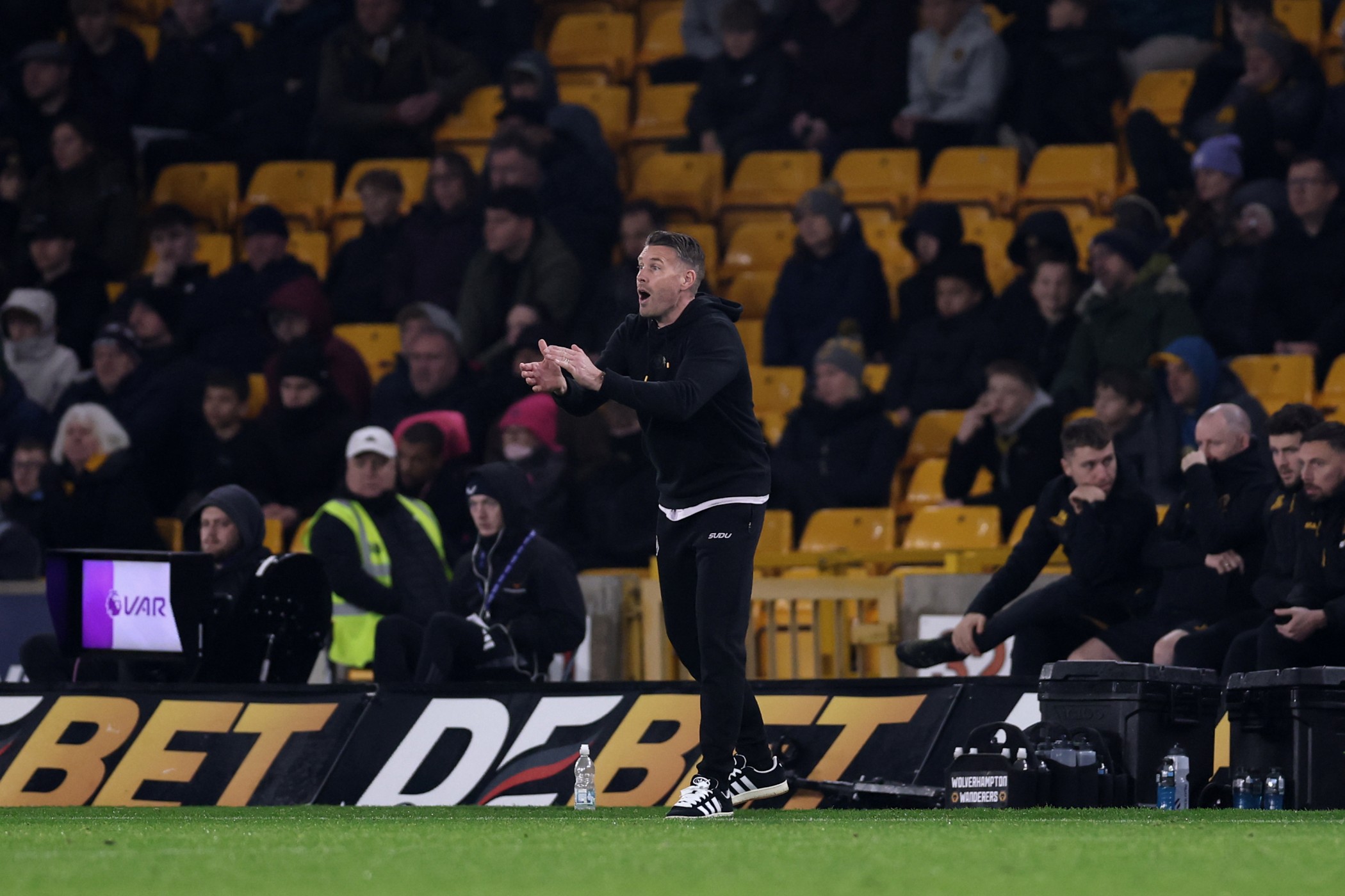 Rob Edwards, Manager of Wolverhampton Wanderers, looks on