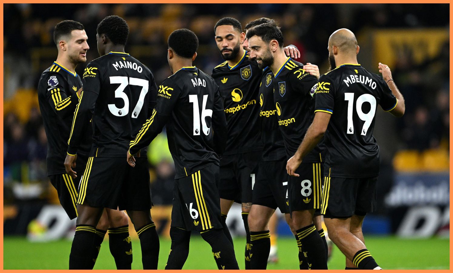 Manchester United players celebrate during their win against Wolves