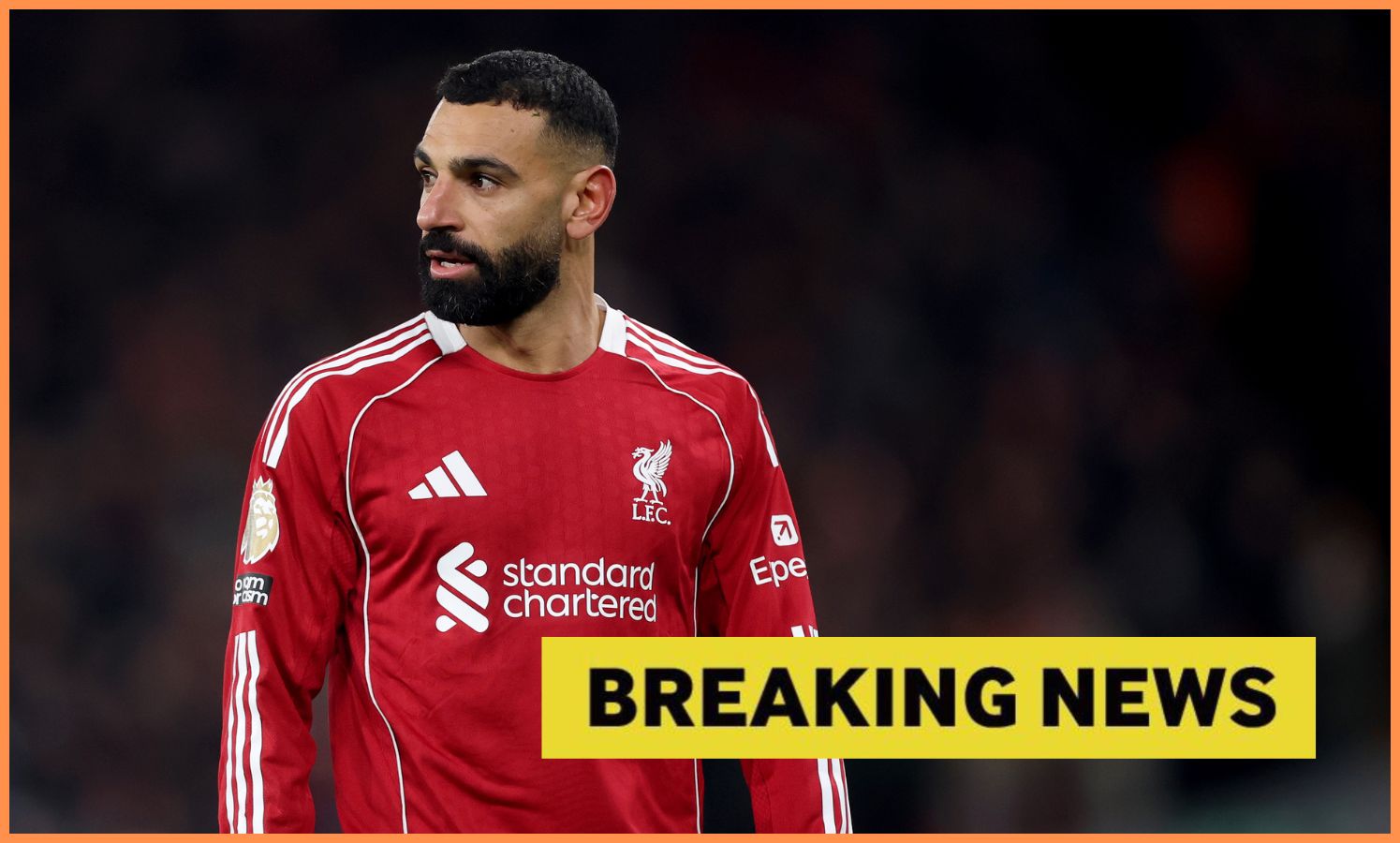 Liverpool's Mohamed Salah and 'breaking news' banner