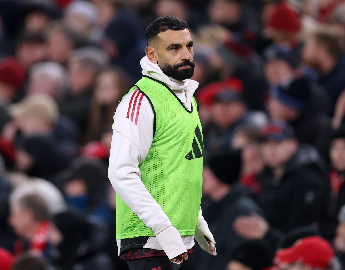 Mohamed Salah warming up for Liverpool