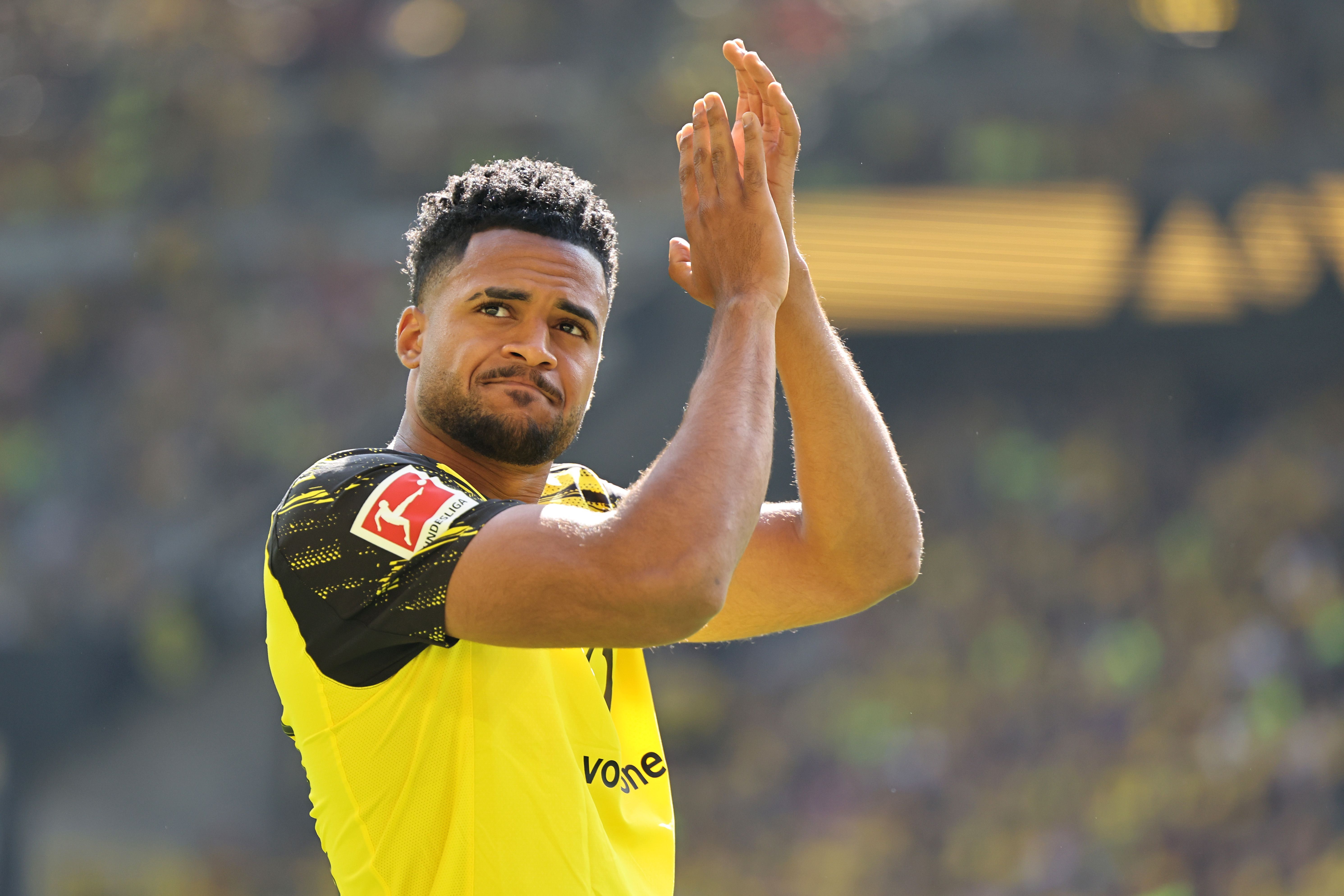 Almugera Kabar of Borussia Dortmund enters the pitch