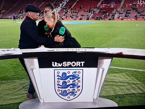 Ian Wright helping Laura Woods after she collapsed live on air