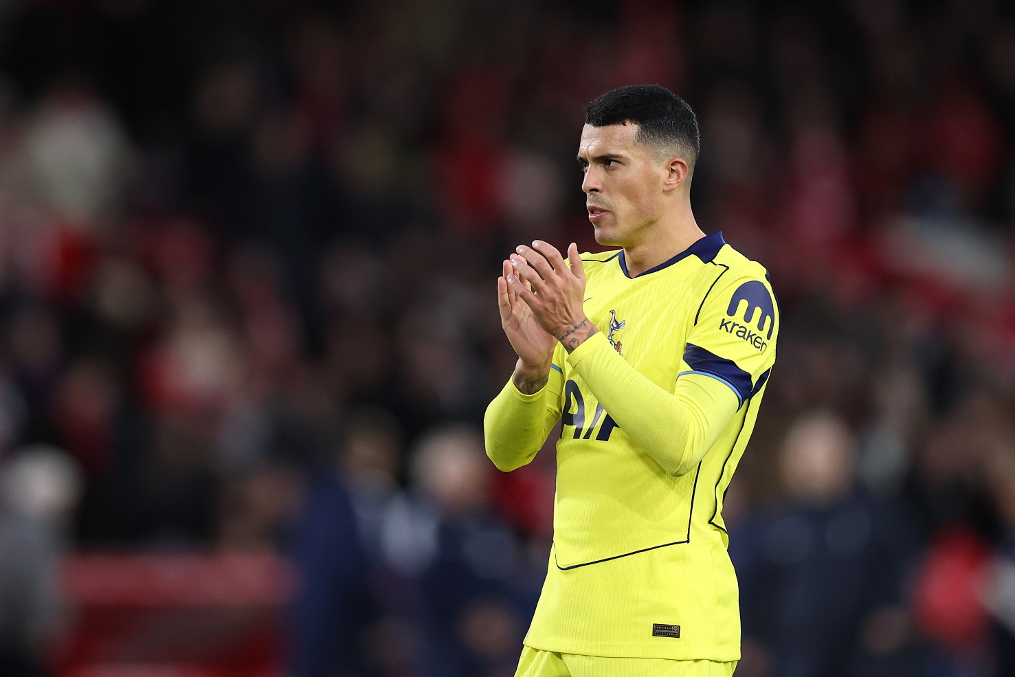 Pedro Porro of Tottenham Hotspur acknowledges the fans