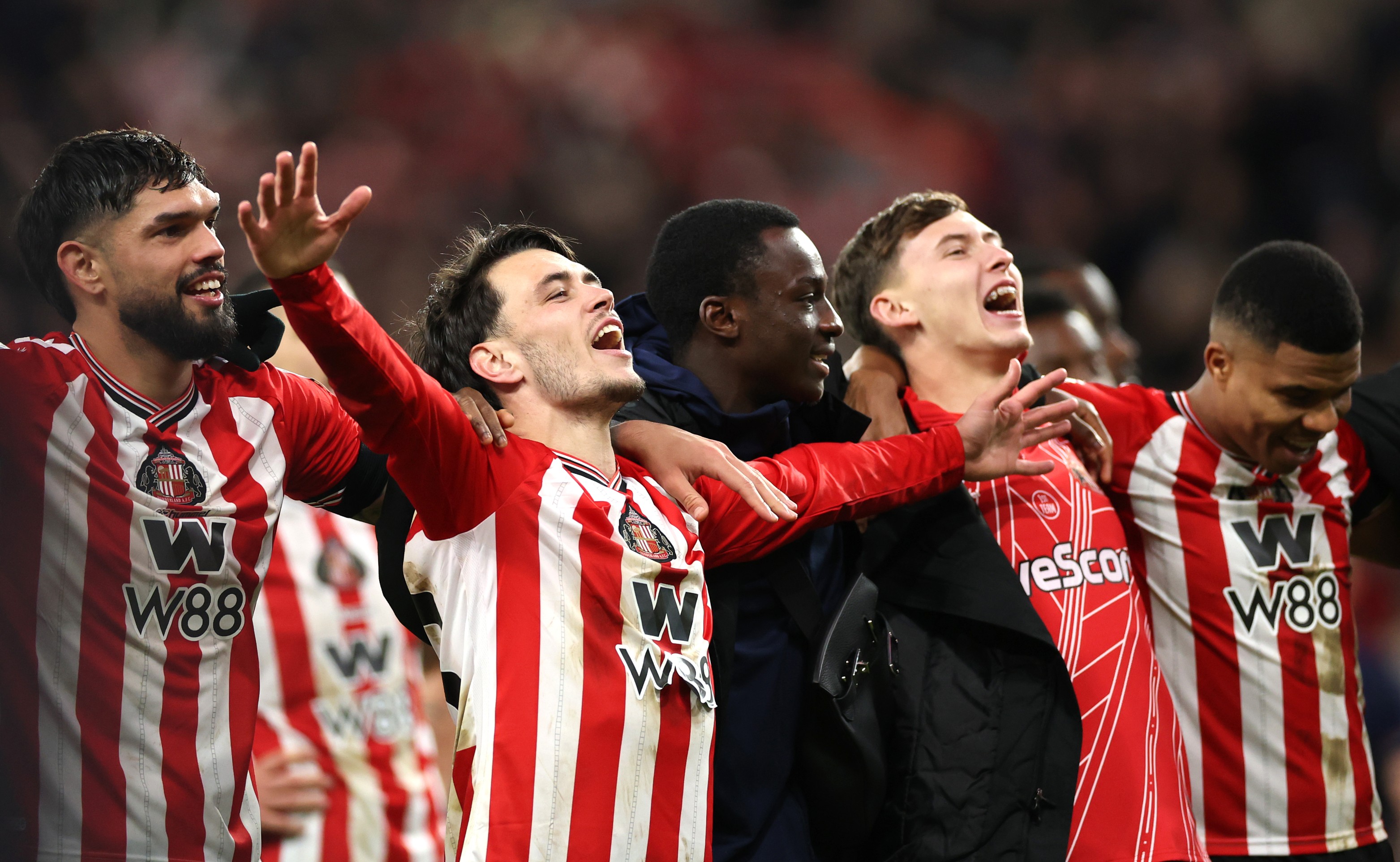 Enzo Le Fee of Sunderland and team mates celebrate victory