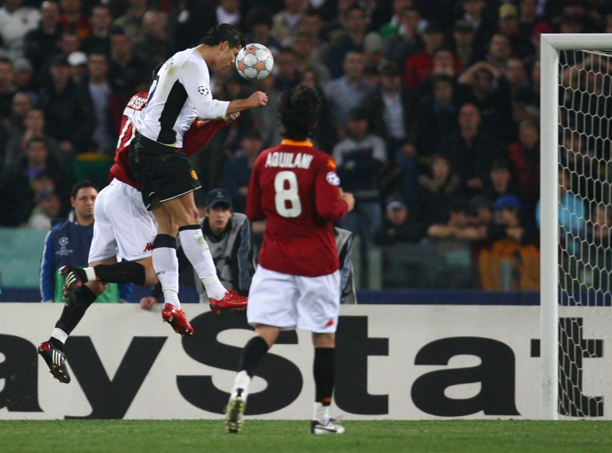 Cristiano Ronaldo scores a header for Manchester United against Roma