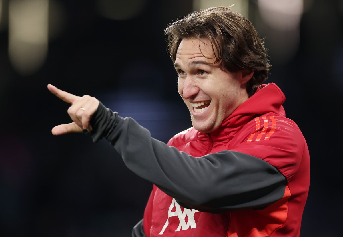 Federico Chiesa gestures during Liverpool's pre-match warm-up
