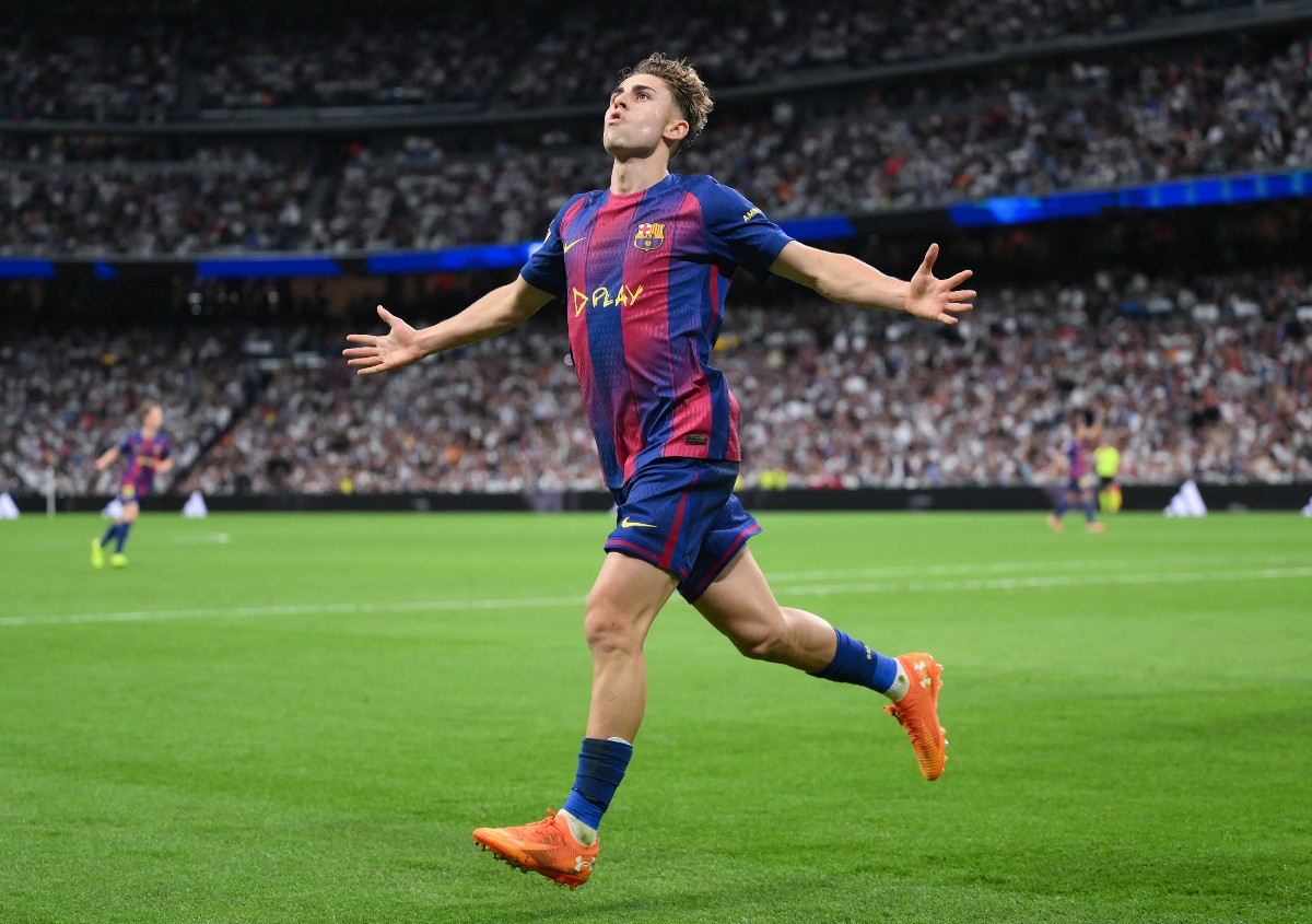 Fermin Lopez celebrates scoring for Barcelona against Real Madrid