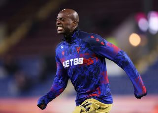 Jean-Philippe Mateta warming up for Crystal Palace
