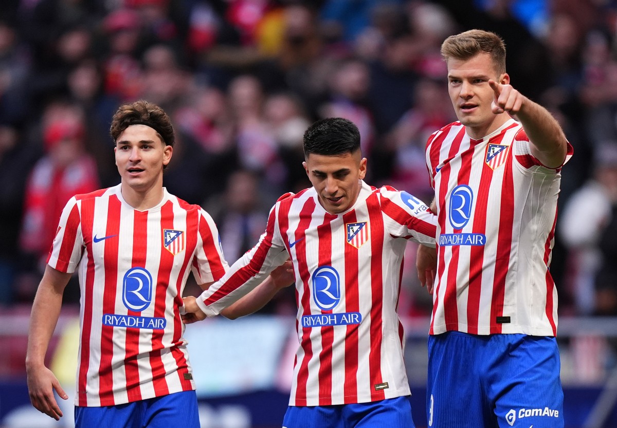 Julian Alvarez celebrating with his Atletico Madrid teammates