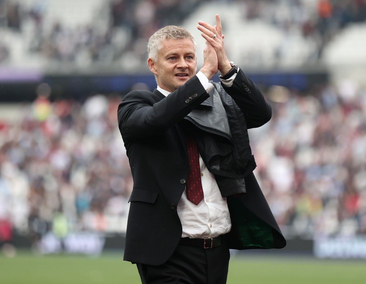 Ole Gunnar Solskjaer applauding the Man United fans after a game in 2021