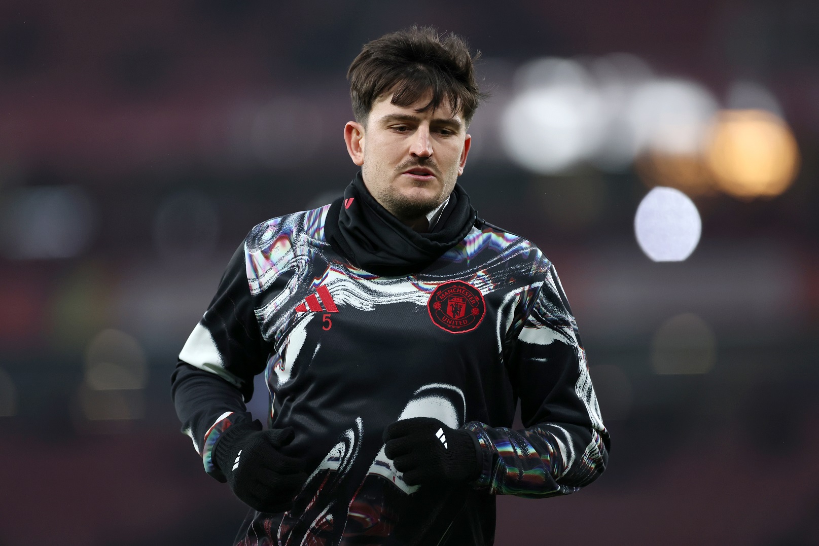 Harry Maguire of Manchester United looks on