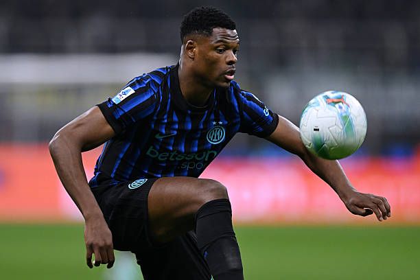 Denzel Dumfries of Inter in action during the Serie A match between FC Internazionale and SS Lazio at Giuseppe Meazza Stadium.