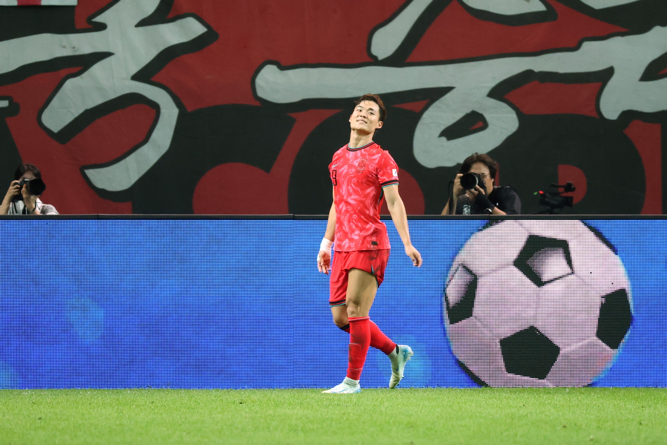 Oh Hyeon-gyu of South Korea celebrates after scoring