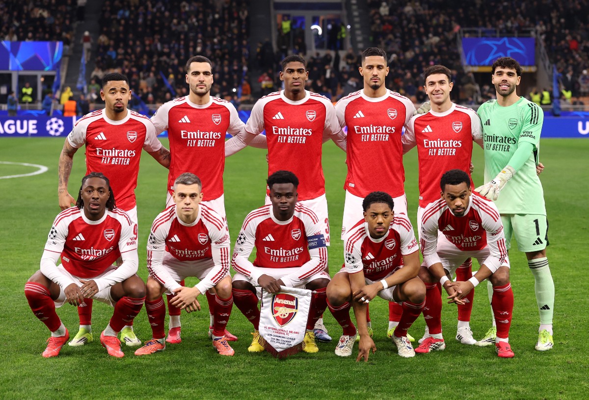 Arsenal players lining up for a Champions League game