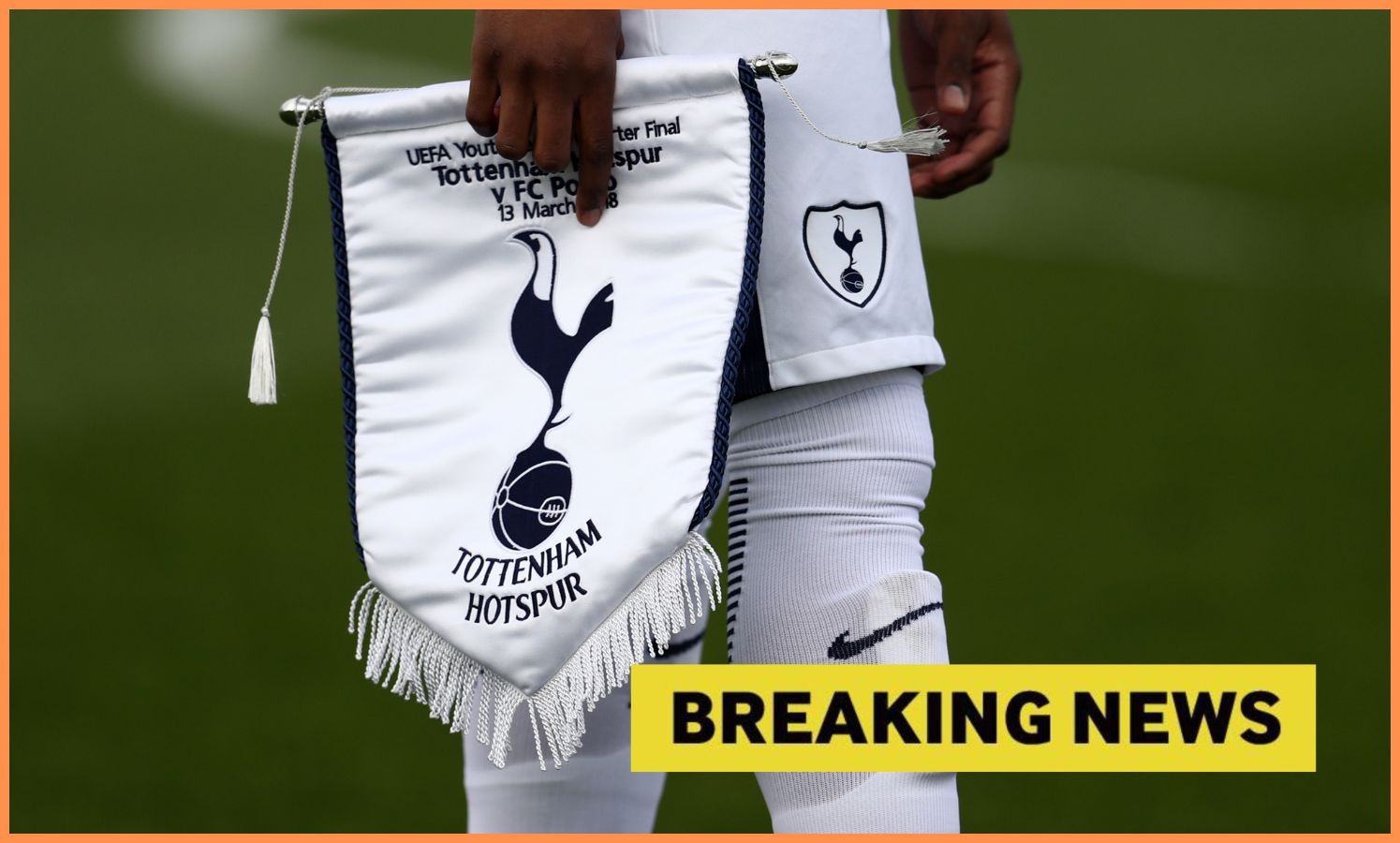 Tottenham Hotspur logo and 'breaking news' banner