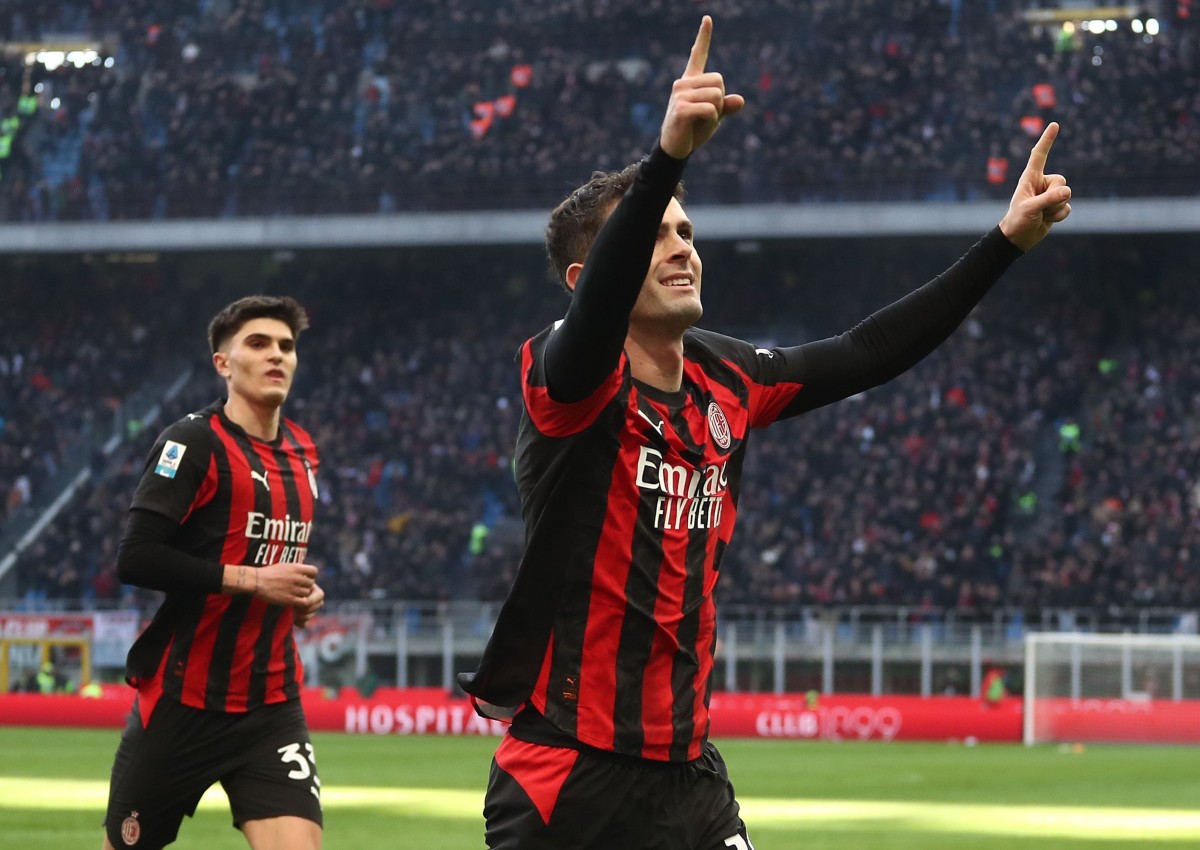 Christian Pulisic celebrates a goal for AC Milan