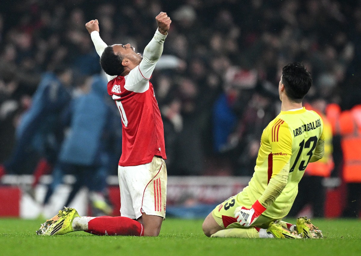 Gabriel and Kepa celebrate as Arsenal beat Chelsea in the Carabao Cup