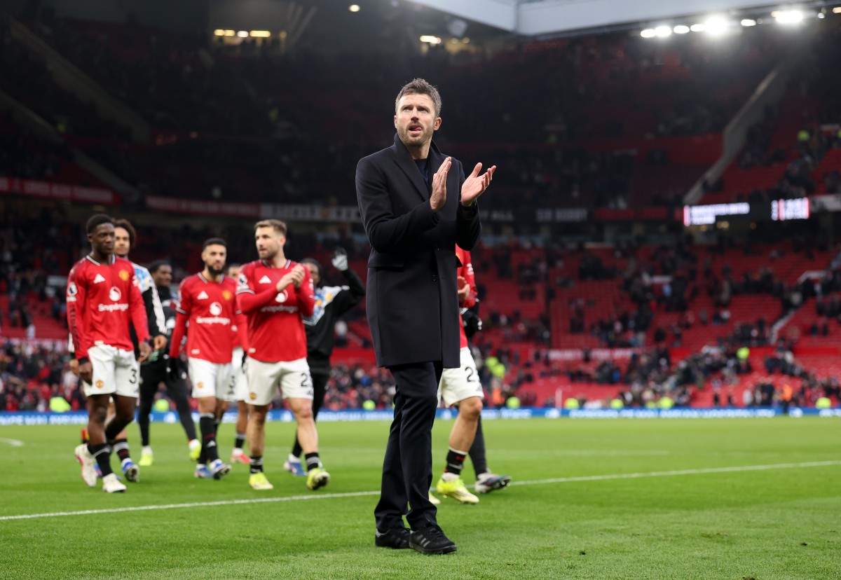 Michael Carrick applauds the Manchester United fans
