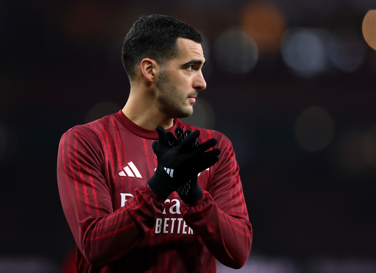 Mikel Merino applauds the fans whilst warming up for Arsenal