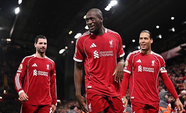 Ibrahima Konate of Liverpool celebrates scoring his team's fourth goal with teammates Dominik Szoboszlai and Virgil van Dijk during the Premier League match between Liverpool and Newcastle United at Anfield
