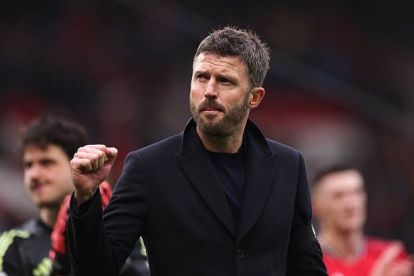Michael Carrick, Manager of Manchester United, celebrates victory during the Premier League match between Manchester United and Tottenham Hotspur at Old Trafford
