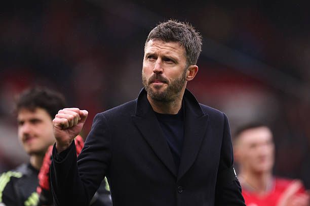 Michael Carrick, Manager of Manchester United, celebrates victory during the Premier League match between Manchester United and Tottenham Hotspur at Old Trafford 