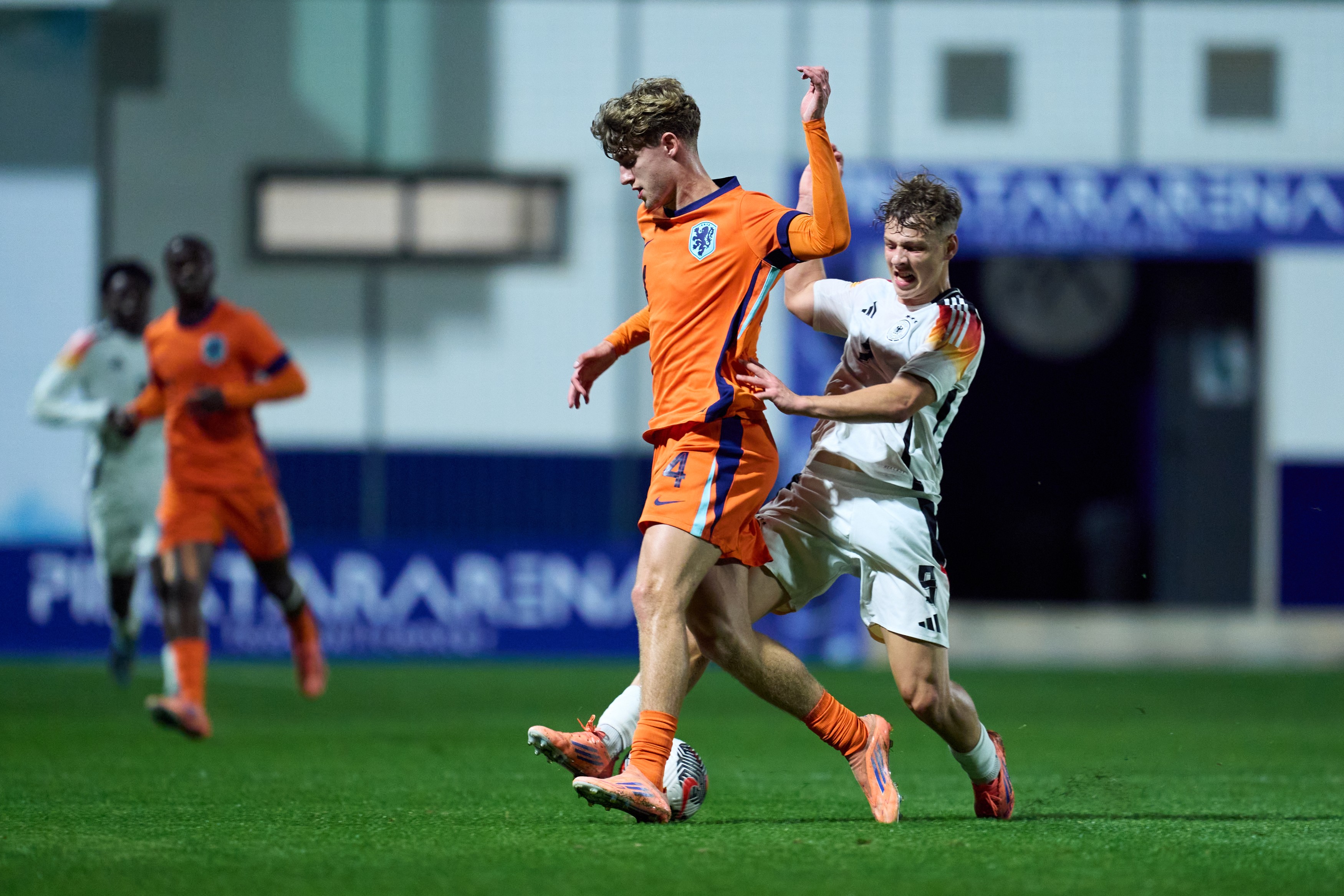  Ruud Nijstad of Netherlands competes for the ball with Robin Stolpe of Germany