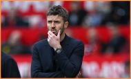 Manchester United interim manager Michael Carrick looks on