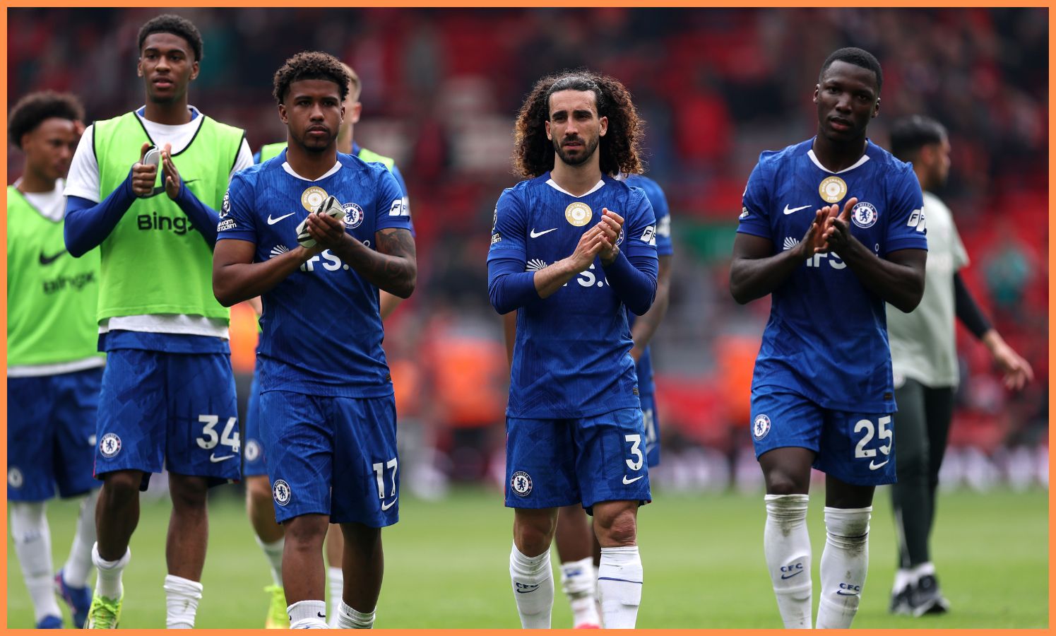 Marc Cucurella applauds the Chelsea fans