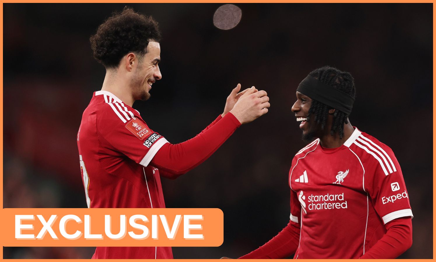 Curtis Jones celebrates with Jeremie Frimpong