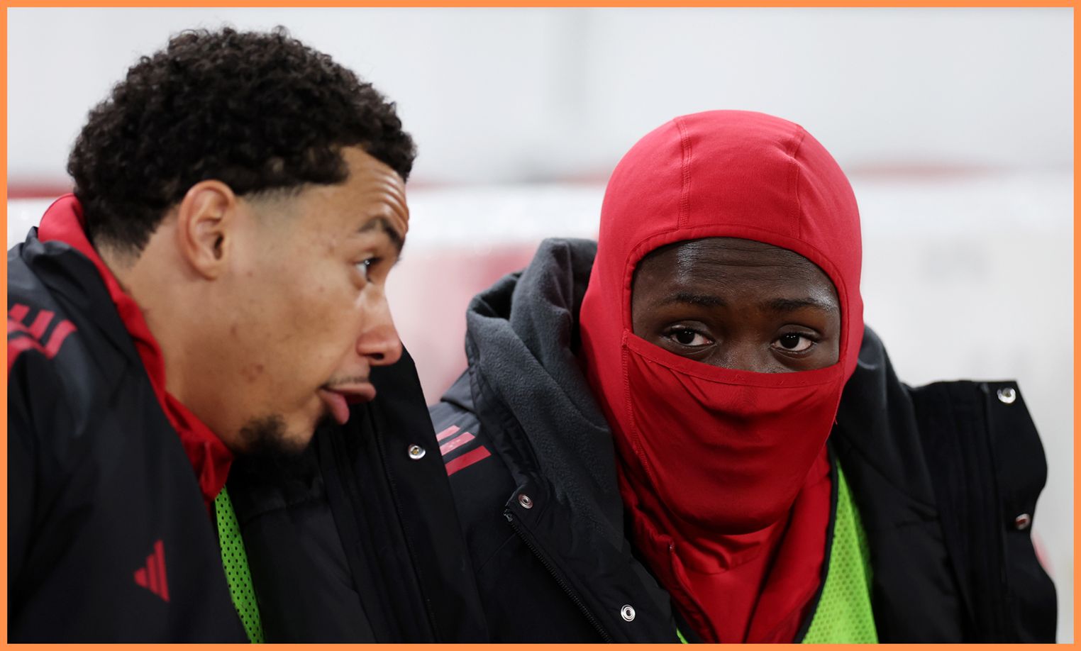 Hugo Ekitike speaks to Ibrahima Konate on the Liverpool bench.