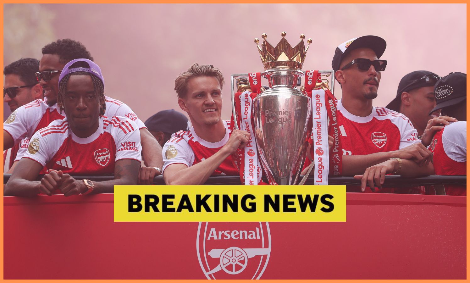 Martin Odegaard with the Premier League trophy at Arsenal's open-top bus parade